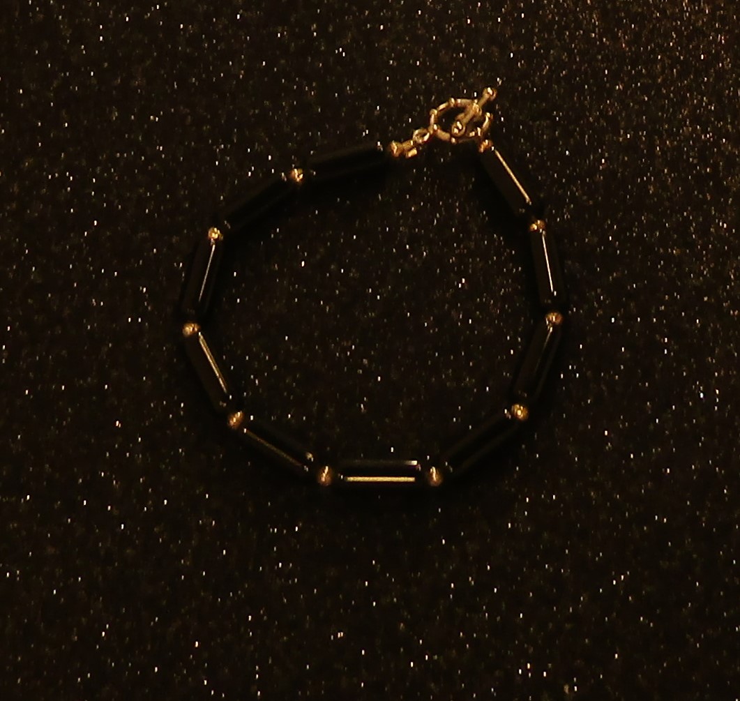 Blackstone Cylinders and silver beads Bracelet
