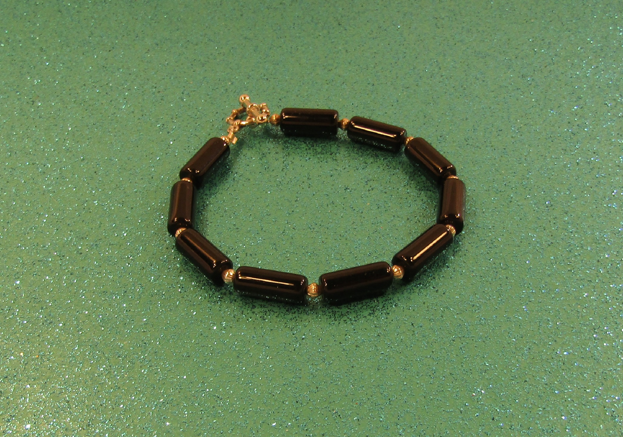 Blackstone Cylinders and silver beads Bracelet